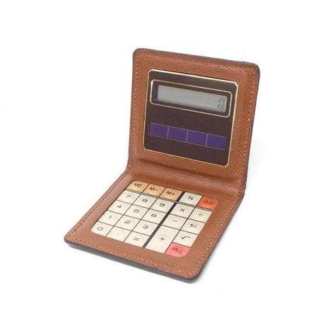 louis vuitton monogram pocket calculator.